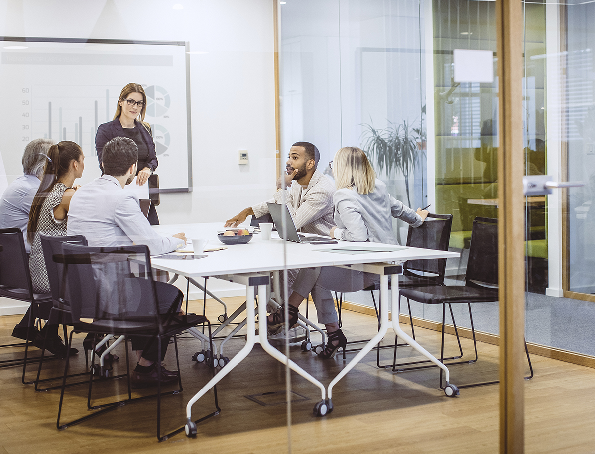 Business People Having a Meeting in The Board Room